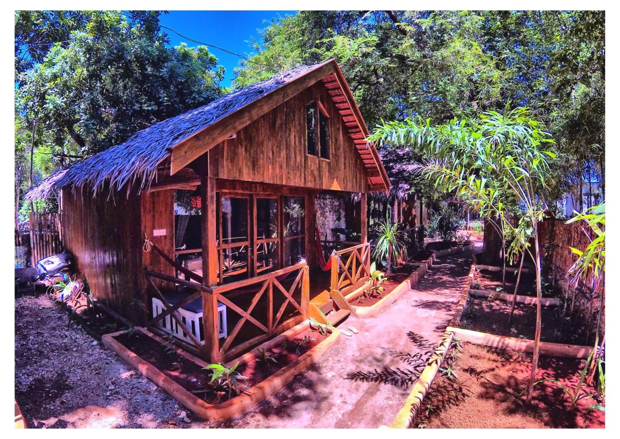 Cosmos Bungalows Bira Buitenkant foto