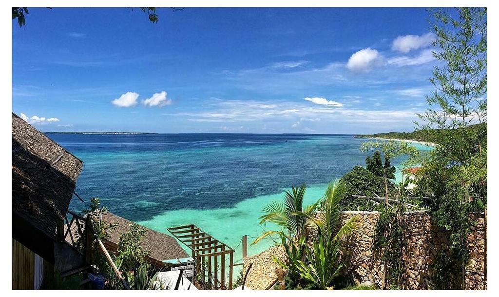 Cosmos Bungalows Bira Buitenkant foto